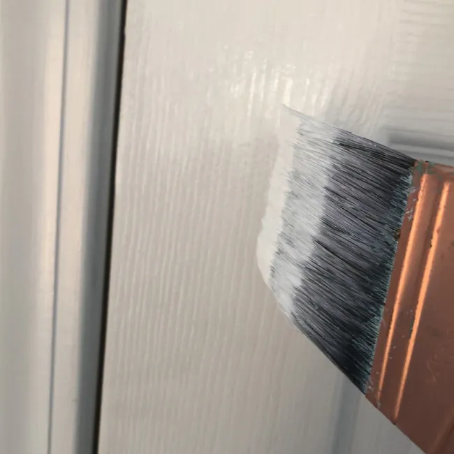 close up of a paint brush during interior painting service freemansburg pa